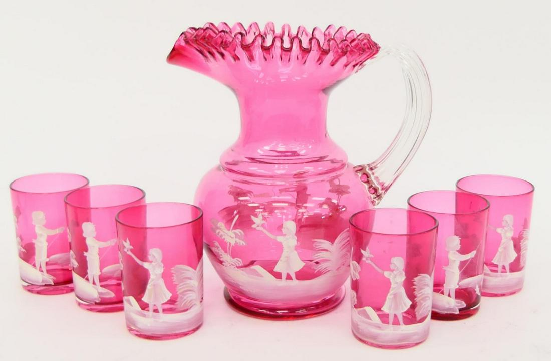 VINTAGE CRANBERRY MARY GREGORY PITCHER & 6 GLASSES: Pitcher stands 9 1/2" tall, has applied handle, 6 matching water or juice tumblers each 4" tall. Third party shipping required