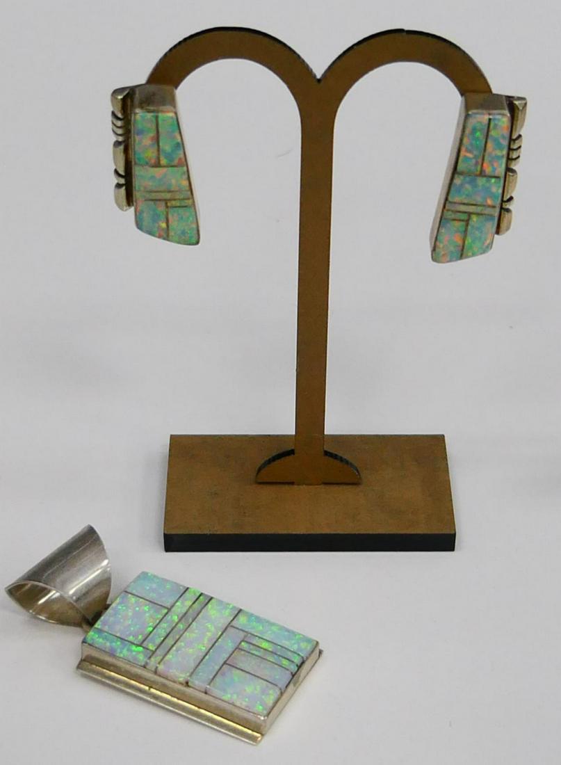 NAVAHO DONALD DOUGLAS STERLING & OPAL SUITE: By one of the premiere Navajo Native American jewelry makers. This suite was purchased in New Mexico over 40 years ago and NEVER worn. Still has the original $220 price tag, that today would be well o
