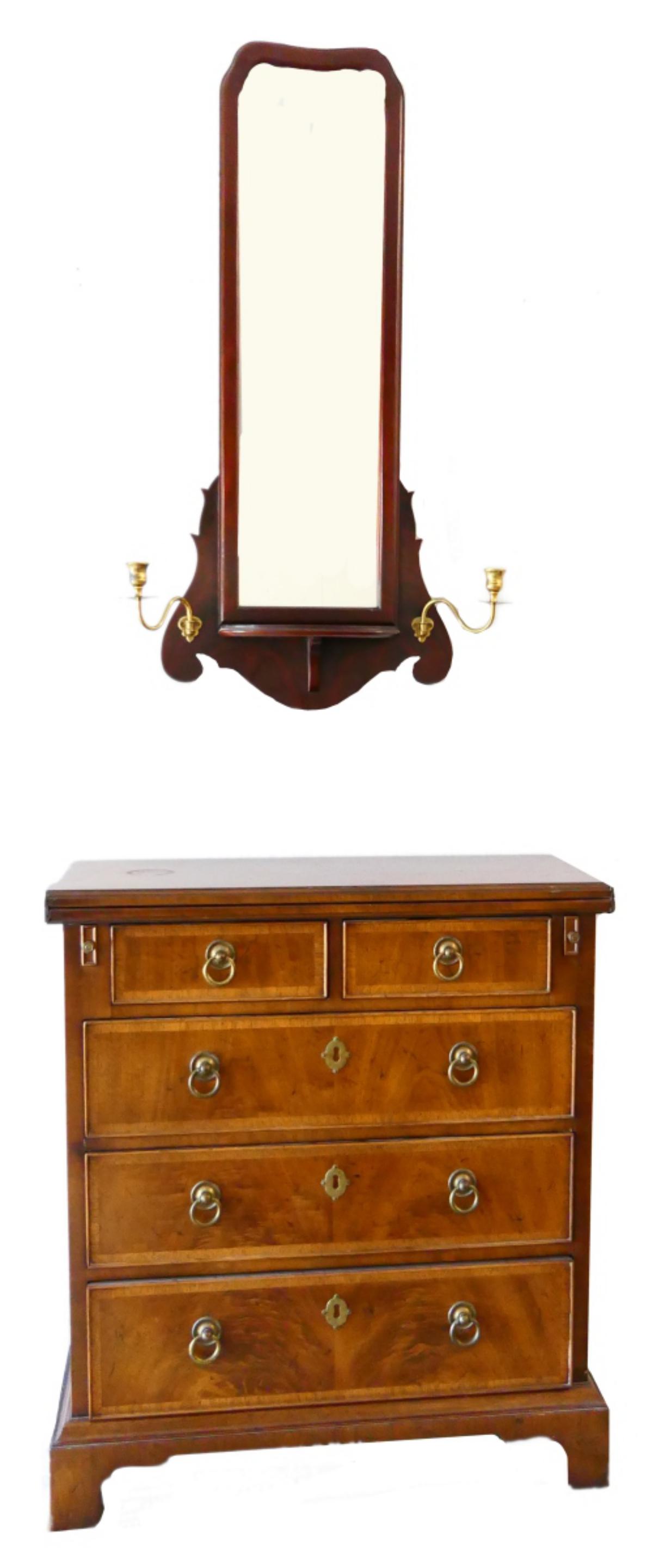 SMALL SIDE TABLE WITH WALL MIRROR ABOVE: Contemporary table with measures about 26" wide. Above the table is a wall mirror with attached sconces