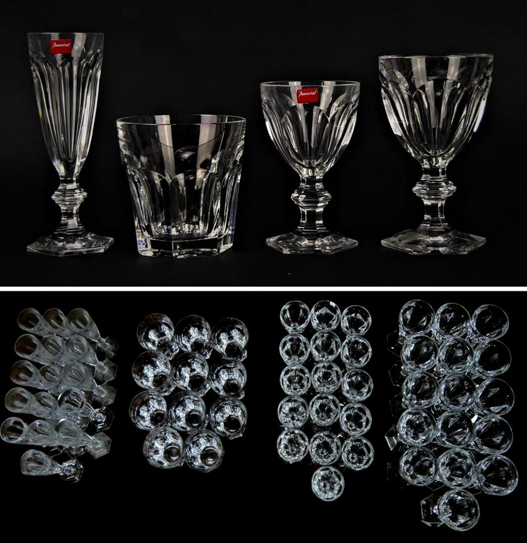BACCARAT (59) PIECES OF HARCOURT MOST NEVER USED: One of the oldest patterns of Baccarat crystal. From a Mia,mi Beach estate we offer the following; (16) wine glasses of 5 1/2" each , (16) champagne glasses each 7" tall, (16) water glasses 6" tall, a
