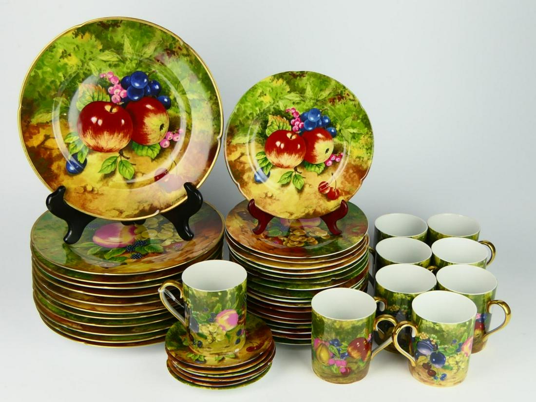 45pc ROCHARD LIMOGES "A T HERITAGE" FRUITS CHINA: A 45 piece Rochard Limoges, French porcelain China dinnerware items in the "A. T. Heritage" still life fruits design. Set is to include 12 dinner plates (10 1/4"), 18 salad plates (7 1/2"), 9 mugs (3 