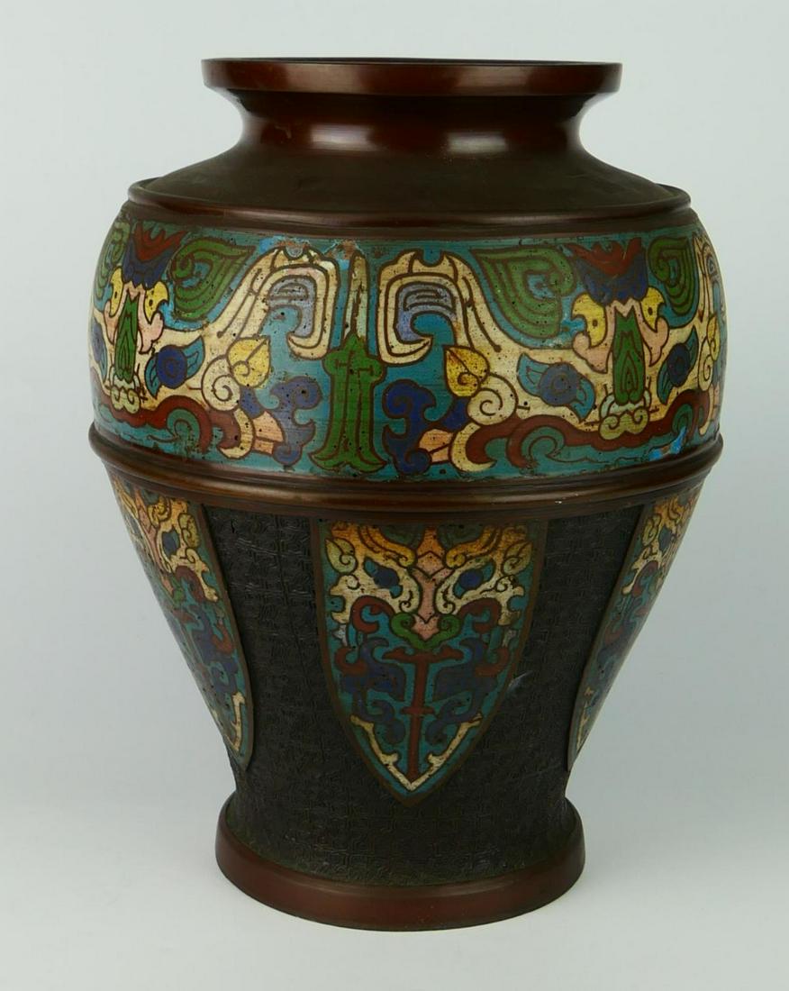 LARGE JAPANESE BRONZE CHAMPLEVE ENAMELED VASE: Vintage large Japanese Champleve enameled vase having archaic Taotie design. Measures approx. 11 7/8" height x 10 1/4" diameter (30.2cm x 26cm).