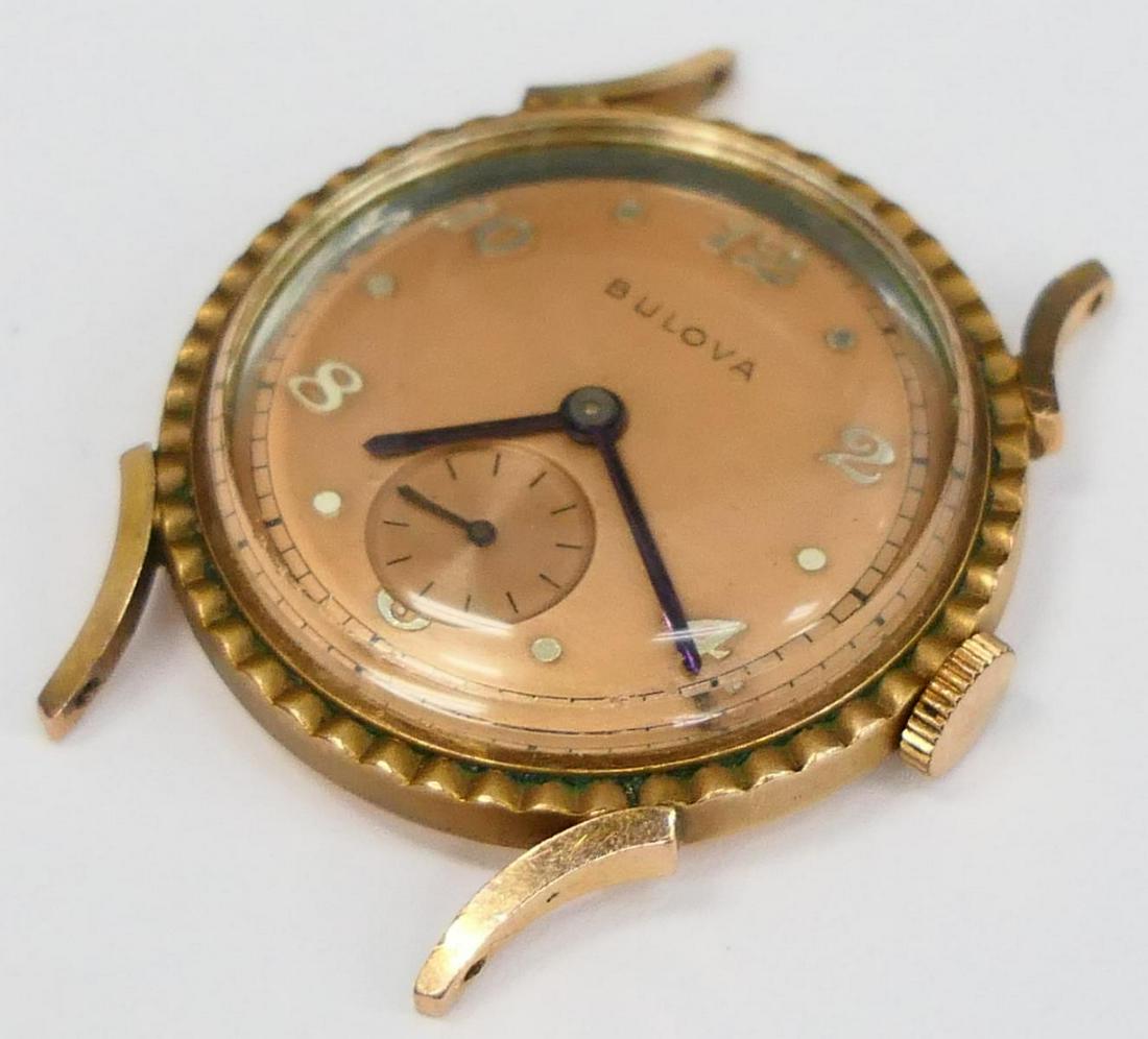 VINTAGE BULOVA 14KT ROSE GOLD FILLED GENTS WATCH: Serial number 6381285 , salmon colored dial.