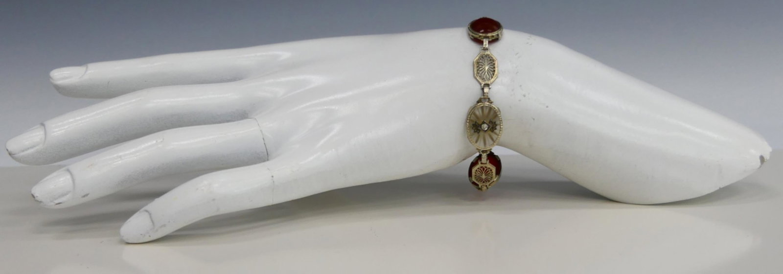 ANTIQUE 14KT W. GOLD CARNELIAN & LAVALIER BRACELET: Measures about 7" long, with 2 oval carnelian stones, and fancy lavalier center. Total weight 8.4 grams / 5.4 DWT
