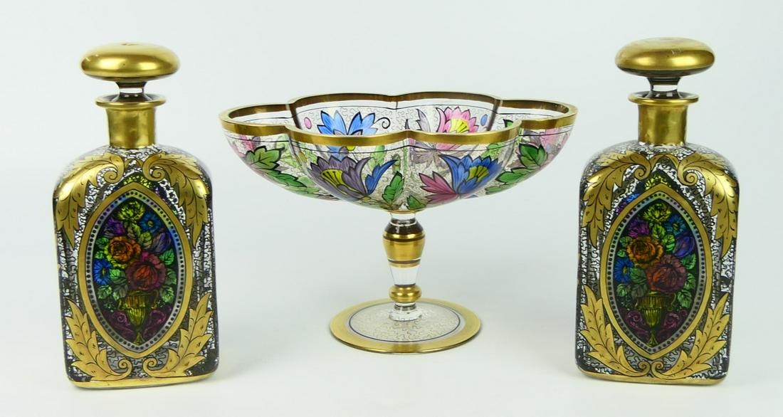 3pc BACCARAT? ART NOUVEAU GLASS FLORAL GARNITURE: Fantastic three piece French, possibly unsigned Baccarat?, Art Nouveau hand blown art glass garniture consisting of two decanters and a ribbed footed bowl. Each with lovely floral gold gilt designs.De