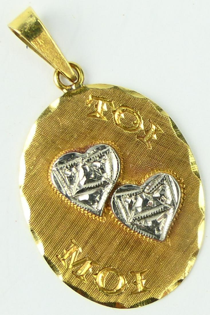 FRENCH 14KT Y GOLD MINE AND YOURS HEART PENDANT: Measures about 1 1/8" in length. Total weight 5.8 grams