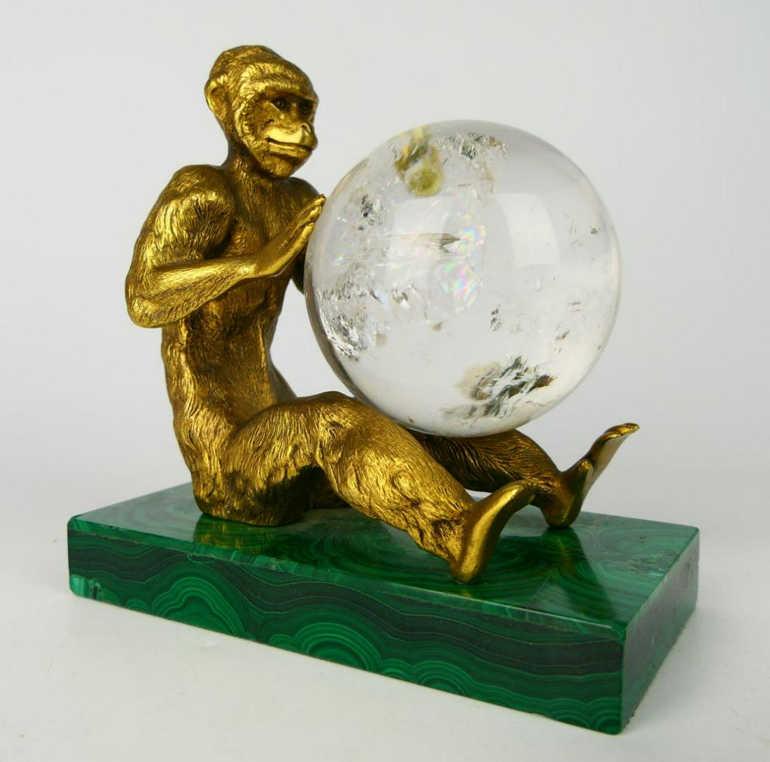 GILT BRONZE MONKEY HOLDING A QUARTZ SPHERE. (1 of 7)