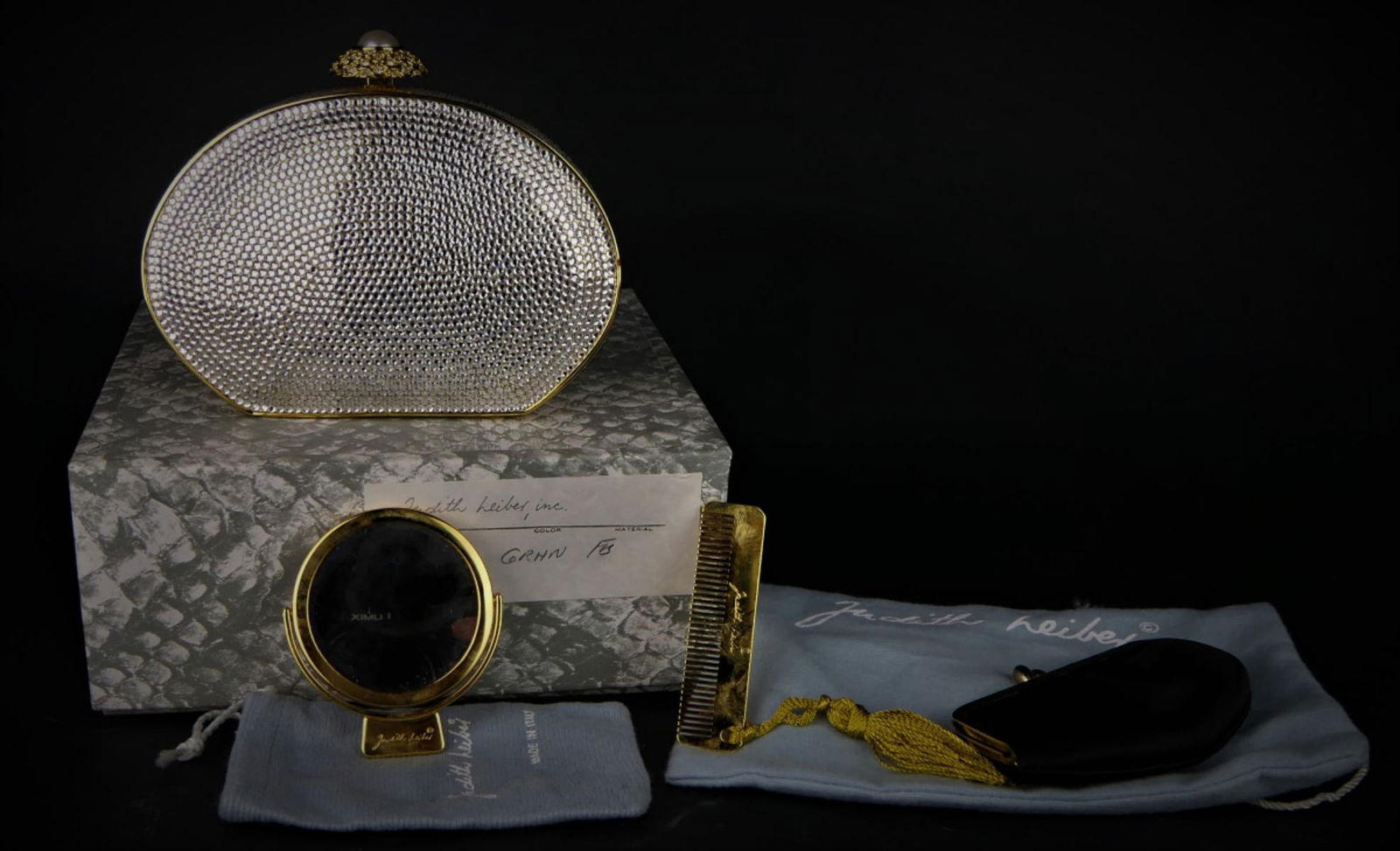 JUDITH LEIBER CRYSTAL CLUTCH WITH BOX: Clutch measures 6" wide and 4" tall, never used , has small change purse and mirror.