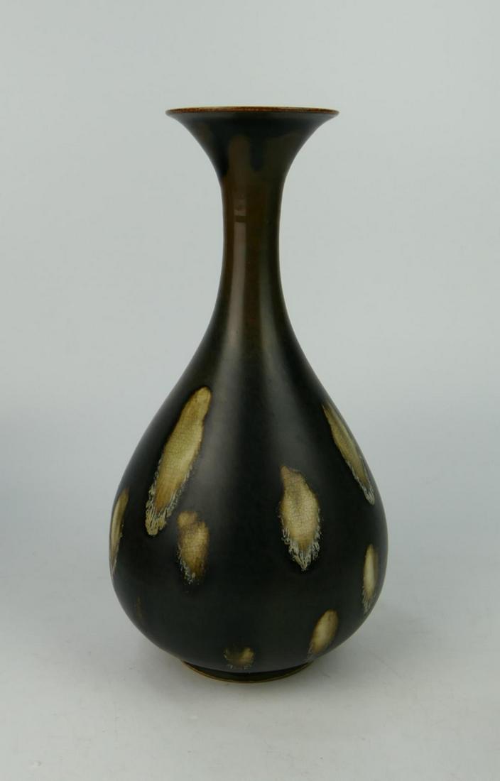 CHINESE BLACK GLAZED DINGYAO YUHUCHUN VASE PROF WU: Chinese black glazed Ding Yao Yu Hu Chun porcelain vase of bottle form with flared rim completed with tan glazed spotting. Measures approx. 10 7/8" height (27.6cm). Provenance: Professor Wu Jilu's Chi