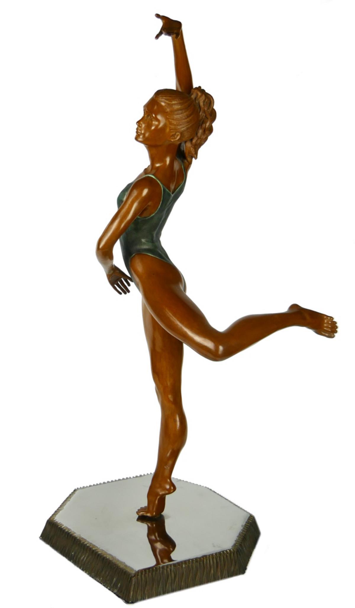 JAVIER VILLARREAL HUGE BRONZE BALLERINA ON BASE: Signed work by Javier villarreal, one of the famous Villarreal brothers. This gorgeous work of art swivels on a mirrored base, and measures 36" high and 16" wide. Signed by Villarreal and numbered 27/