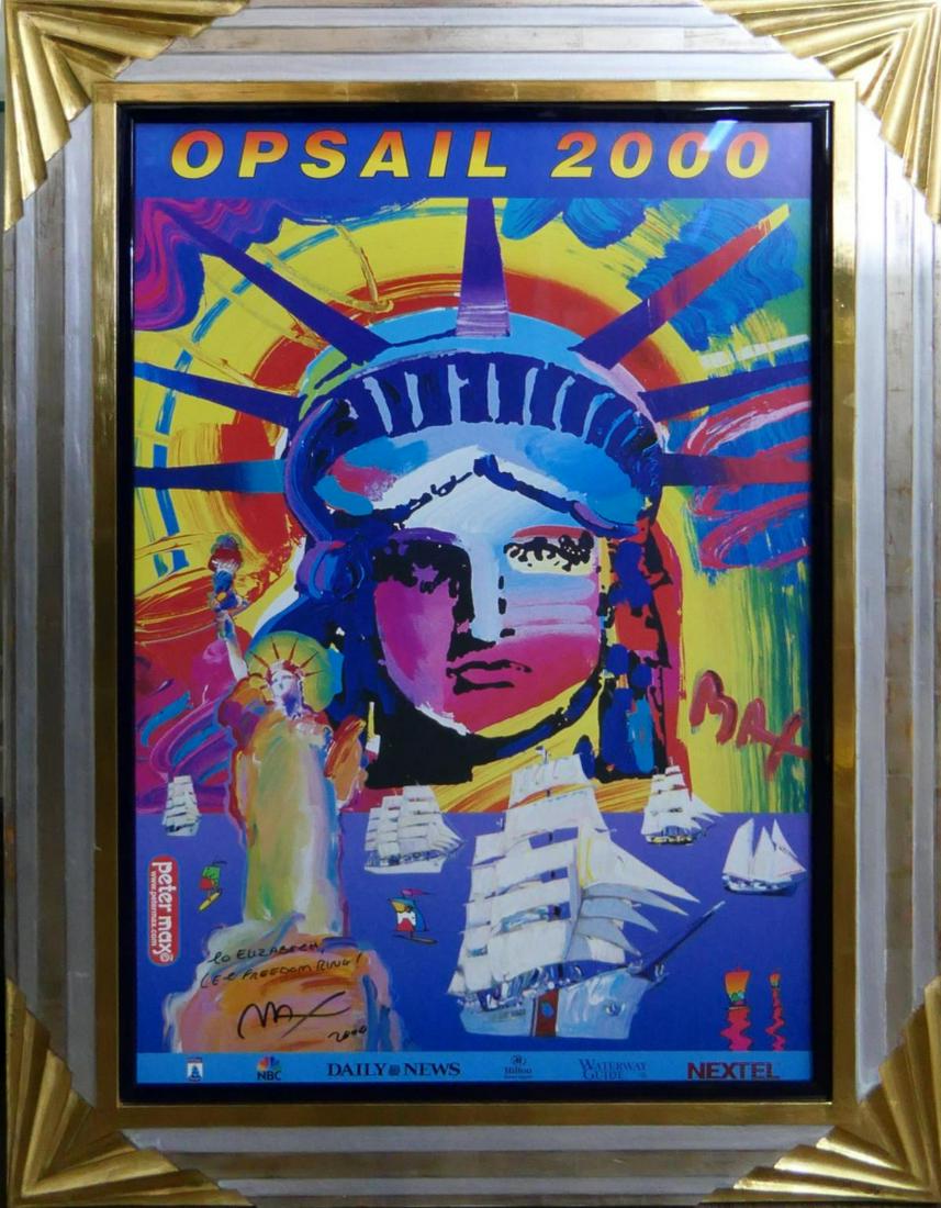 PETER MAX SIGNED "OPSAIL 2000" POSTER FRAMED: Peter Finkelstein Max (GERMAN /AMERICAN / NEW YORK, born 1937) hand signed "Opsail 2000" poster. Marker signed with dedication and dated 2000. Mounted in a very nice silver and gold gilt wooden frame 