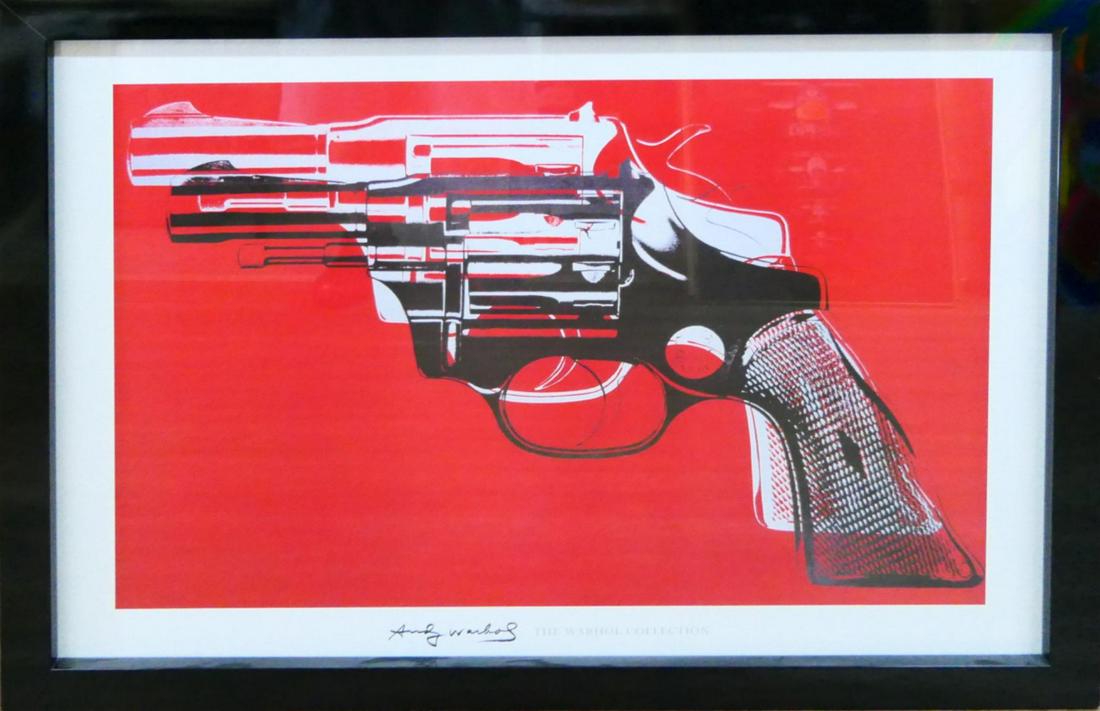 ANDY WARHOL POP ART PRINT/POSTER 'GUN: Striking pop art red 'Gun' print. Framed professionally by gallery.. Size of frame H 32 inch x W 42.2 inch Print size (red area) H 25 inch x W 35 inch