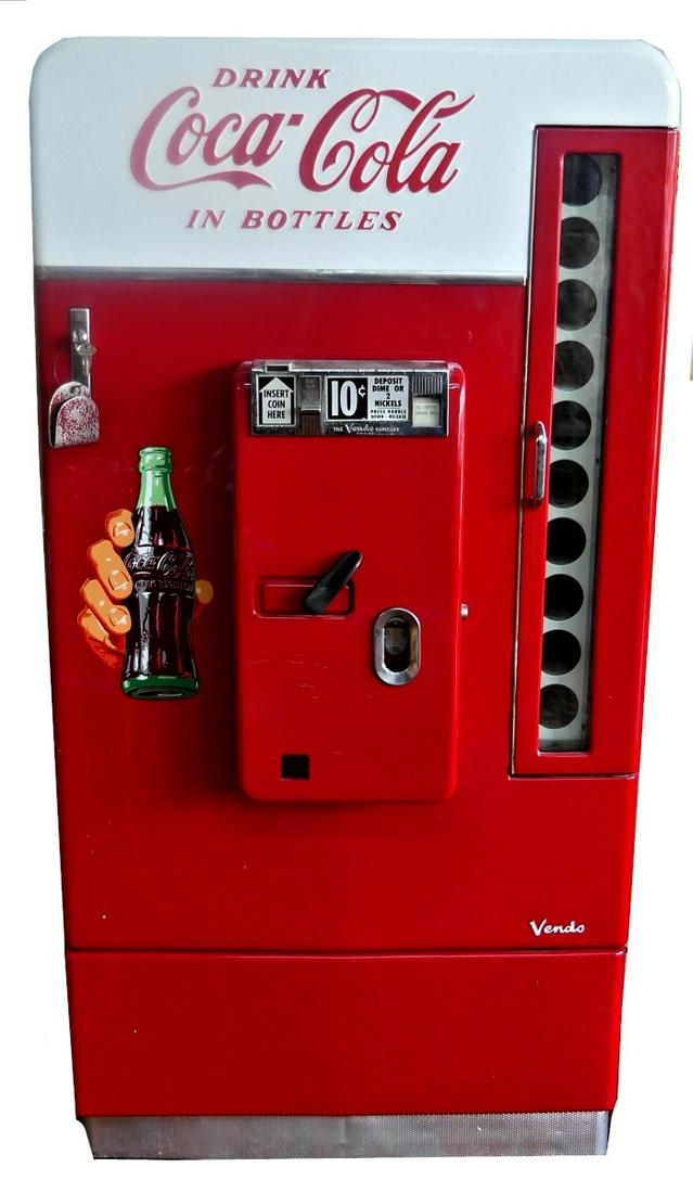 VENDO VINTAGE 10 CENT COKE MODEL 81 MACHINE: Vendo Vintage Model 81 10 Cent Coke Machine, red with white top, painted hand holding a Coca-Cola bottle on the front door 58 x 27" x 18"" ORIGINAL KEY