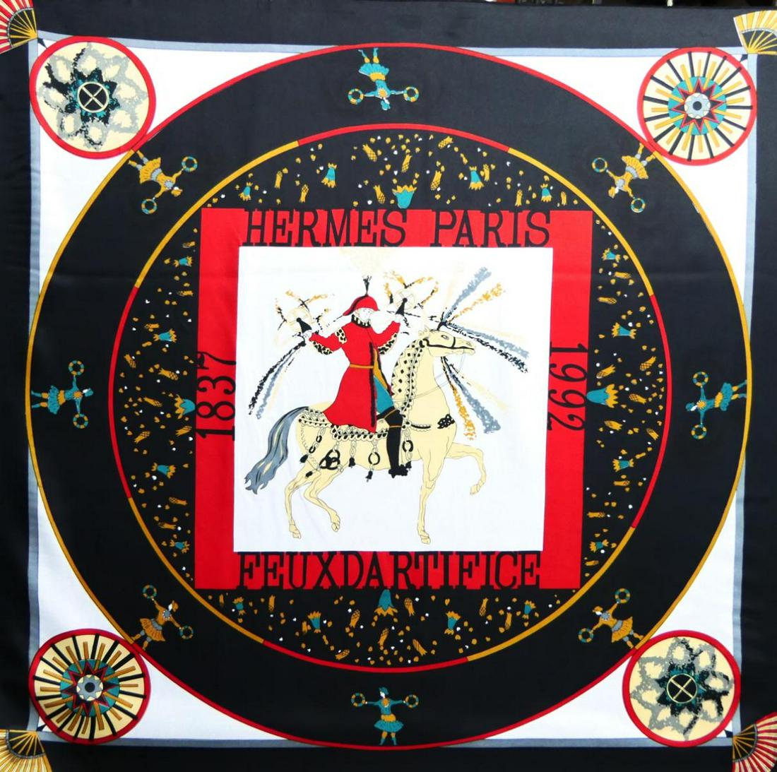 HERMES SILK SCARF: Scarf measures 34" square. Please note the scarf is mounted to a card board backing, suitable for framing