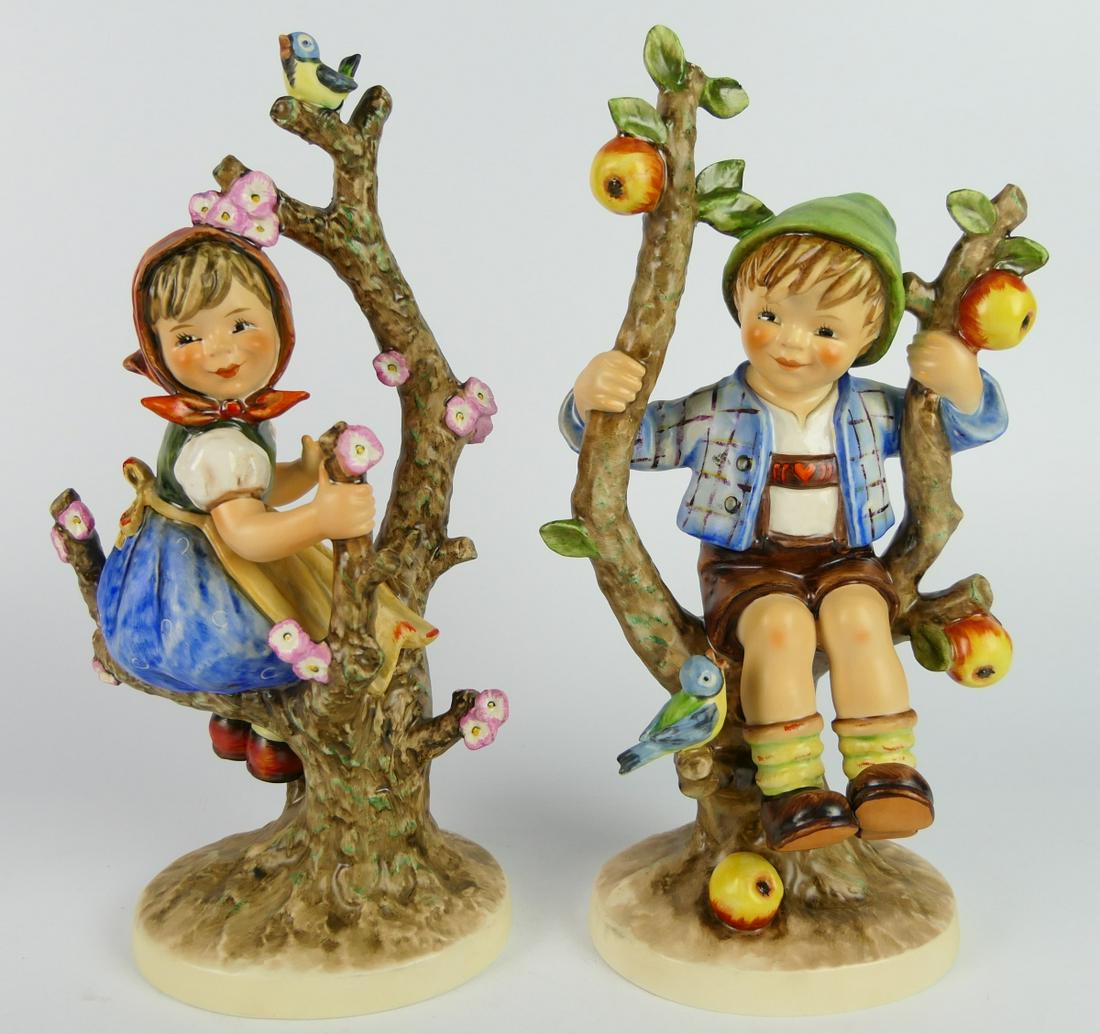 PAIR OF HUMMEL CHILDREN SITTING IN TREES: Measures - 7.5" h.
