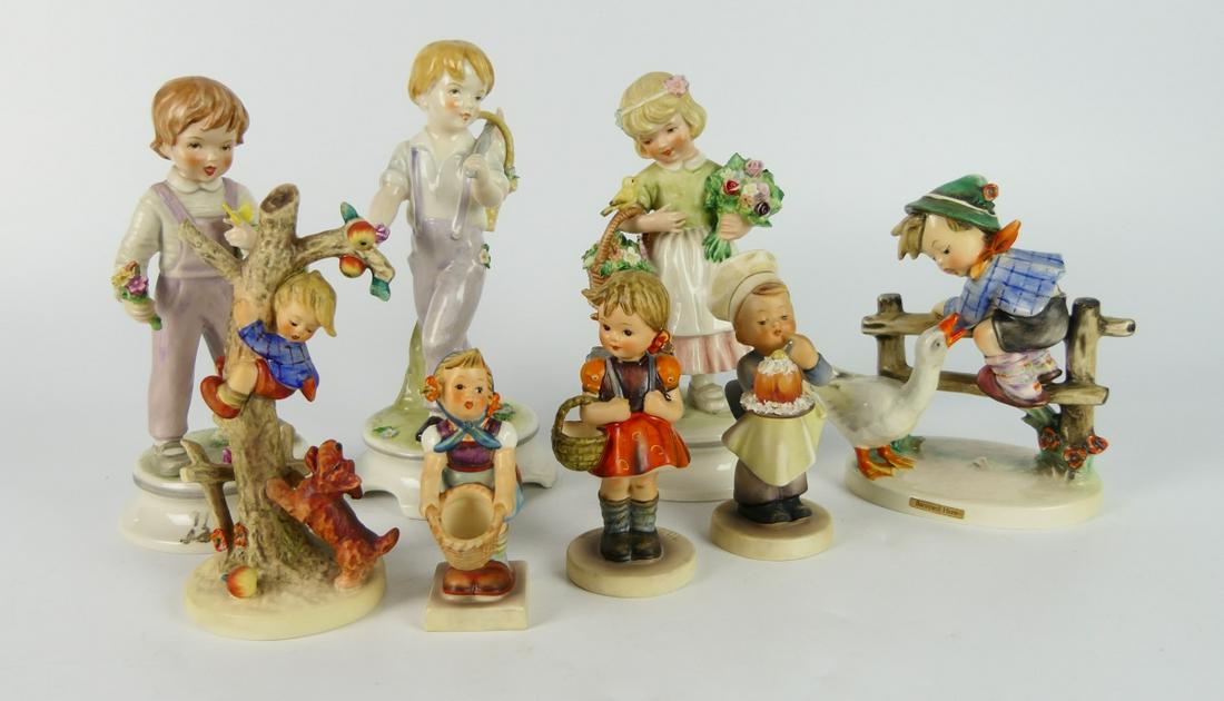 (8) HUMMEL PORCELAIN FIGURES: Mesaurements vary.
