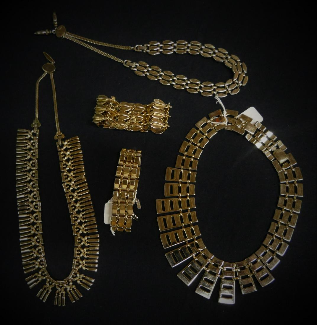 LOT OF MONET GOLD TONE JEWELRY NEVER WORN: 3 Gold tone heavy choker necklaces and 2 braceletd
