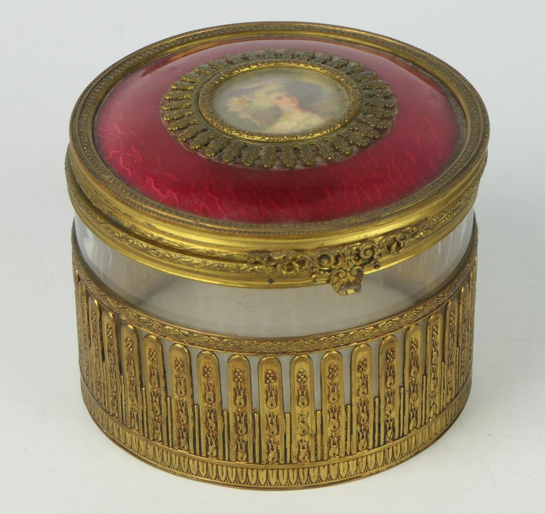 ANTIQUE LARGE GUILLOCHE PORTRAIT DRESSER JAR: 4 1/2" Wide, 3 1/2" tall. Mounted in brass casing with hinged mirrored lid. Most likely French