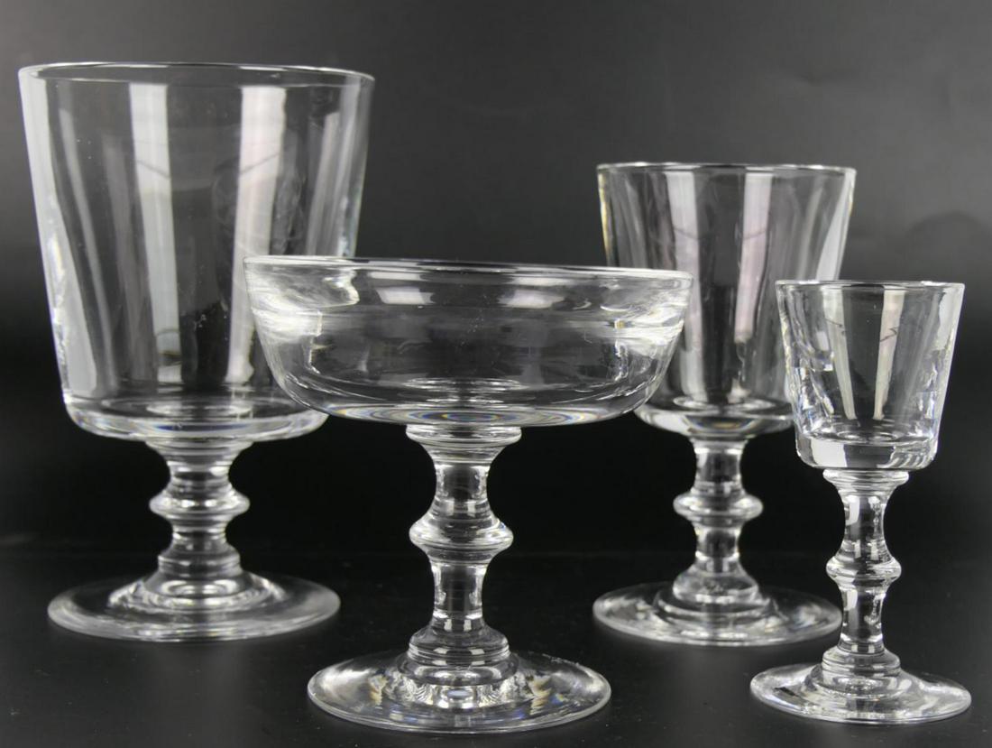 COLLECTION OF STEUBEN GLASS STEMWARE: A Collection of Steuben Glass Stemware with original boxes. 12- cordials approx `4" tall. 12- martini glasses approx 3" 3/4tall. 12-wine glasses approx 5" tall.12-water glasses approx 6" tall.