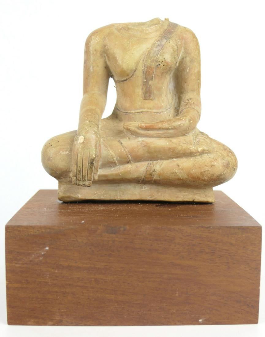 ANTIQUE THAI TIBETAN CARVED HARDSTONE BUDDHA: Antique Thai or possibly Tibetan carved hardstone sculpture depicting seated Buddha. Mounted in atop wooden base. Measures approx. 5 1/2" height x 4 1/4" width (14cm x 10.8cm) overall including base.