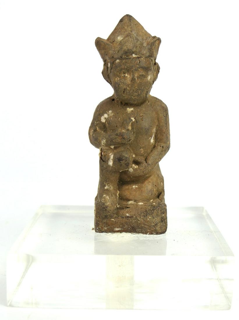 ANTIQUE POLYNESIAN CARVED SCULPTURE ON ACYLIC BASE: Antique Polynesian? Asian? carved brown stone sculpture depicting a kneeling deity holding a hulu double gourd. Mounted on a clear acrylic lucite base. Measures approx. 4 1/2" height x 3" width x 3" d