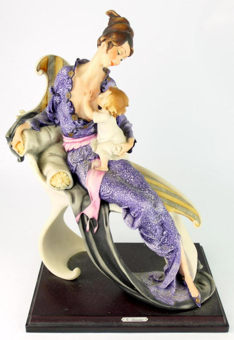 15" TALL GUISEPPE ARMANI LADY WITH BABY: 15" TALL GUISEPPE ARMANI LADY WITH BABY.