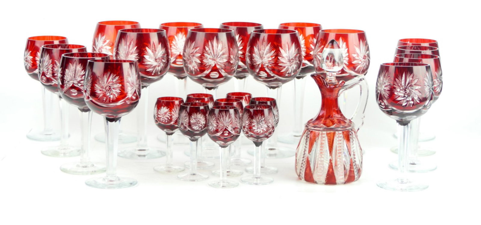 24 BOHEMIAN CRANBERRY DRINKING GLASSES: 24 Bohemian cranberry drinking glasses tallest 8 water glasses measures approx 8 1/2" . 8water glasses measures approx 6 1/2". 8 cordials measures approx 4".