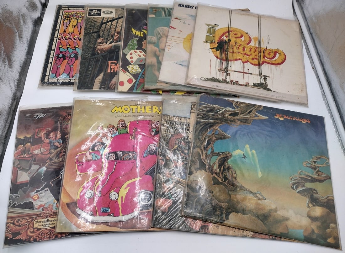 COLLECTION OF 9 VINTAGE VINYL 12" RECORDS: A collection of 9 vintage 12" vinyl records to include Frank Zappa "Discreet", Mothers "Just Another Band From L.A.", The Mothers "Grand Wazoo", Yes "Yesterdays", "The 1969 Warner / Reprise Record Sho