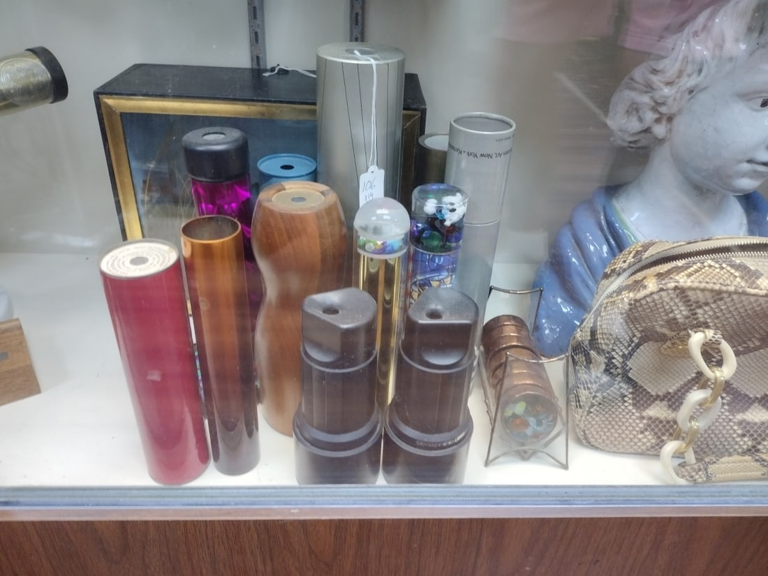 Lot of 20 Various Material Vintage Kaleidoscopes: A lot of various vintage kaleidoscopes crafted of metal, wood and more. Largest dimension approx. 10 1/2" length.