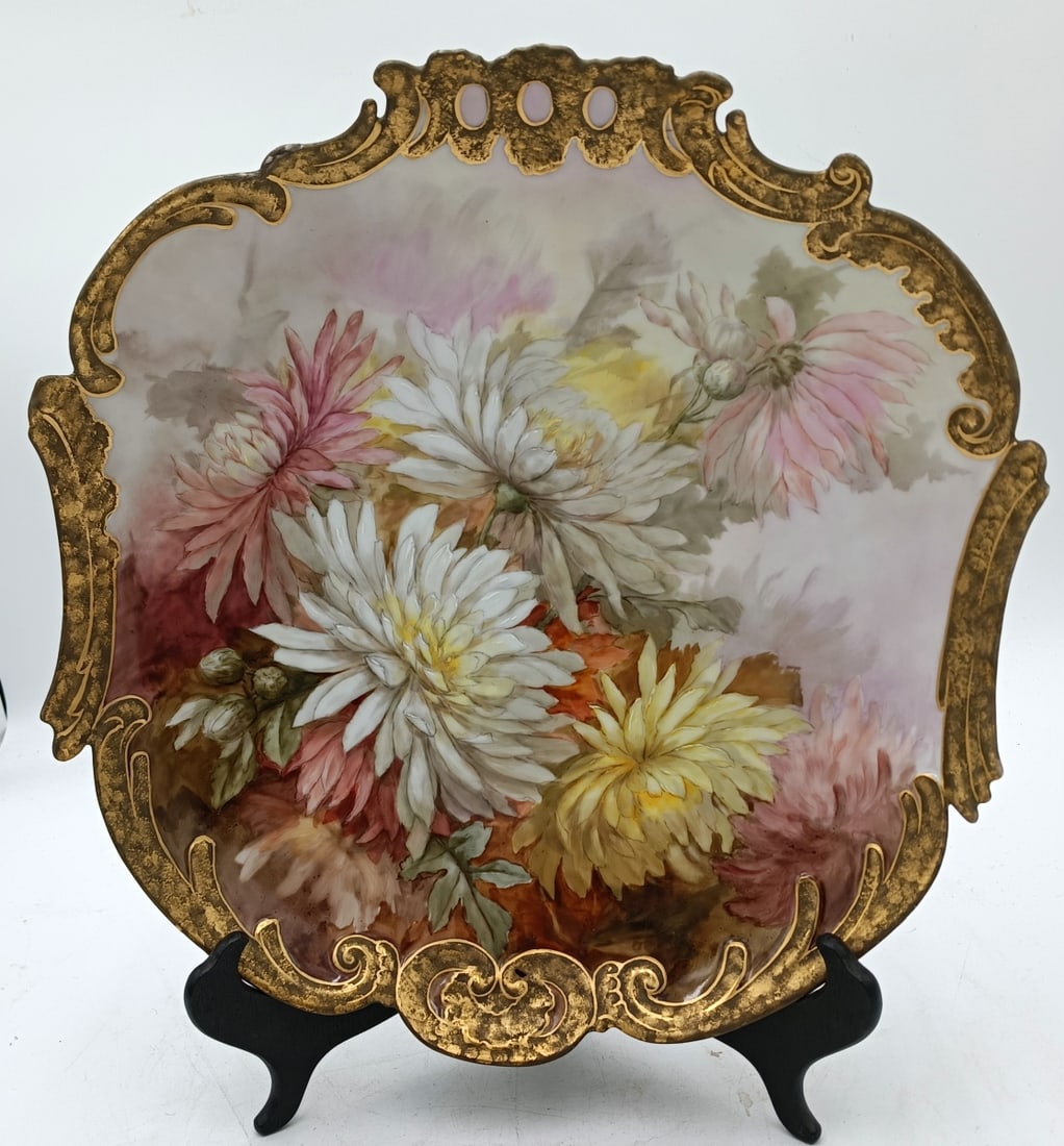 ANTIQUE LIMOGES HAND PAINTED CHRYSANTHEMUM PLATTES: Antique Limoges hand painted porcealin rectangular scalloped rim platter having a chrysanthemums floral motif. Green stamp mark to bottom. No apparent artist signature. Completed with gilt rim.Measure
