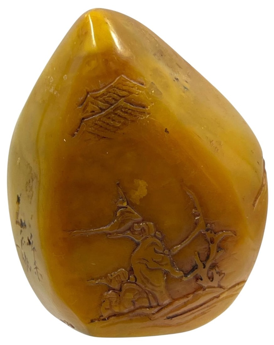 Chinese Shoushan Tian Huang Stone Seal: A finely crafted Chinese Shoushan Tian Huang stone seal, featuring intricate carvings of traditional motifs. The seal showcases a warm, golden hue typical of Tian Huang stone, revered for its rarity a