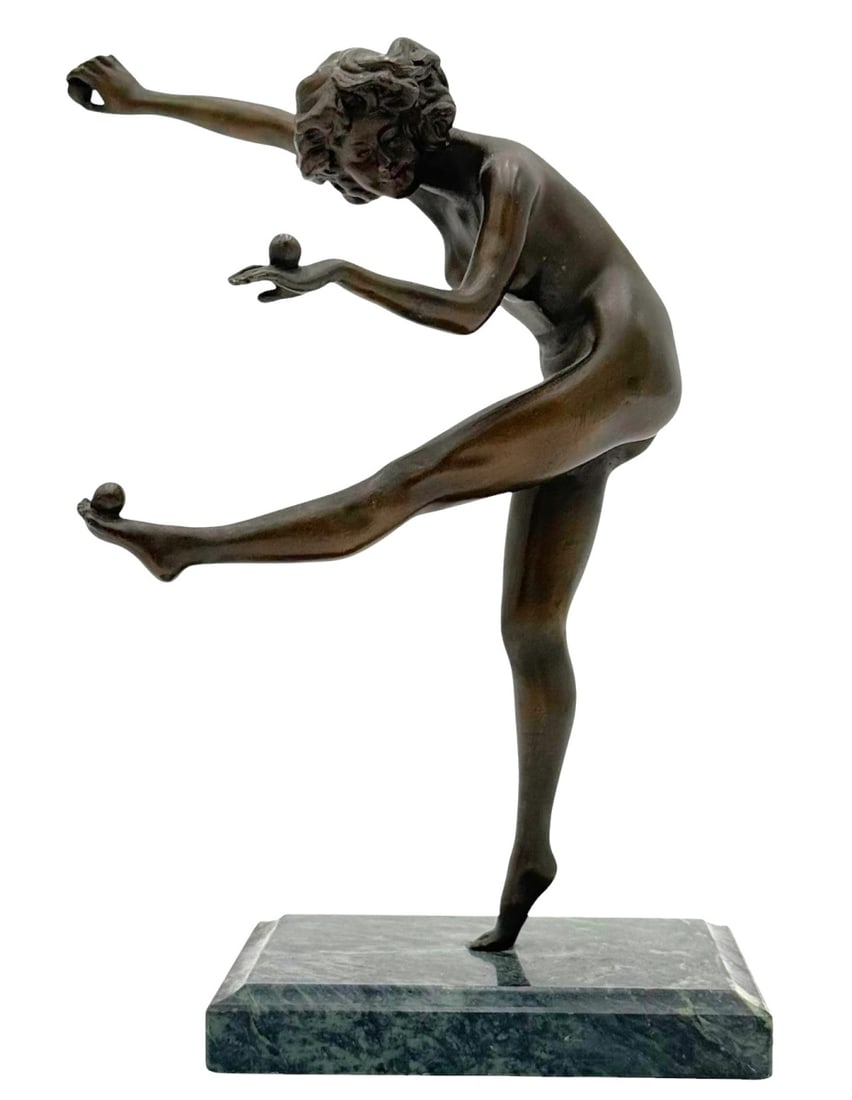Antique Bronze Nude Dancer Sculpture: A captivating Art Deco bronze sculpture titled 'The Juggler' after the renowned artist Claire Colinet (French: 1880-1950). This piece features a graceful female figure balancing on one leg while juggl