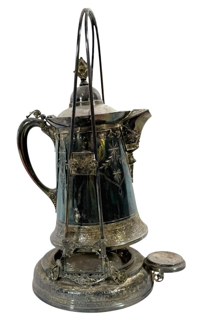 B.F.N. & Co. Silver-plate Tea Pot: An exquisite B.F.N. & Co. silver-plated tea pot featuring intricate floral and geometric engravings. The pot is mounted on a tilting stand, allowing for easy pouring. Its ornate design reflects the Vi