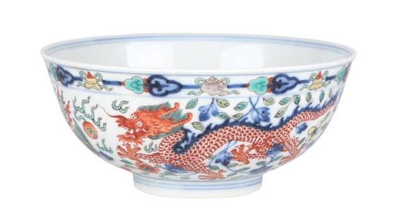 Chinese Wucai Dragon & Phoenix Porcelain Bowl: A beautifully crafted Chinese Wucai porcelain bowl featuring intricate hand-painted designs of dragons and phoenixes, symbols of power and prosperity in Chinese culture. The bowl showcases vibrant col