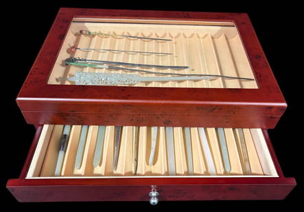 Collection of 16 Chinese Jade & Silver Hair Pins: A beautifully curated collection of 16 Chinese hair pins crafted from jade and silver. Each pin showcases intricate designs, with some featuring carved jade elements and others adorned with detailed s