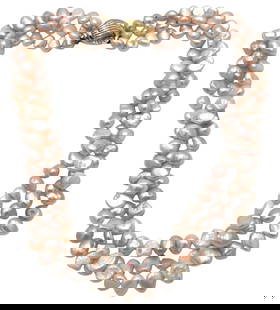 Estate 14K Pink Freshwater Pearl Diamond Necklace: A stunning graduated, triple strand necklace featuring 9mm naturally colored pink freshwater pearls. The strands vary in length from approximately 22 to 24 inches, creating a graceful drape. The neckl