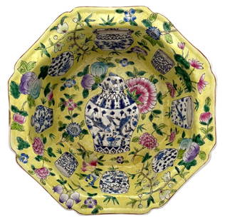 Chinese Hand Painted Yellow Ground Porcelain Bowl: This exquisite Chinese porcelain bowl features a vibrant yellow ground with intricate hand-painted designs. The interior showcases an array of floral motifs and traditional Chinese vases, each adorned