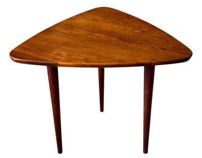 Mid Century Modern Danish Guitar Pick Side Table: A stylish Mid Century Modern Danish side table with a unique guitar pick shape, crafted from rich wood. The table features three tapered legs and exhibits the minimalist design typical of Danish moder