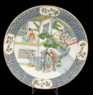 Chinese Hand Painted Famille Verte Porcelain Dish: A beautifully crafted Famille Verte porcelain dish, featuring a detailed court scene with figures in traditional attire. The vibrant palette includes greens, blues, and reds, typical of the Famille Ve