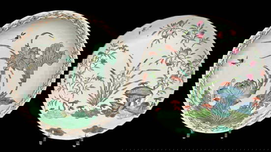 Two (2) Chinese Hand Painted Porcelain Dishes: A pair of exquisite Chinese Famille Verte porcelain plates, each featuring intricate hand-painted designs. One plate showcases a serene scene with lotus flowers and birds, while the other depicts a l
