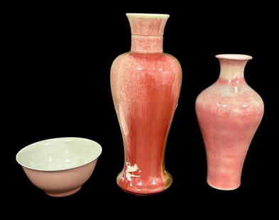 Three (3) Chinese Red Glazed Porcelain Wares: A collection of three Chinese red glaze porcelains, comprising two vases and one bowl. The vases exhibit a rich red glaze with subtle variations in tone, indicative of traditional Chinese ceramic tech