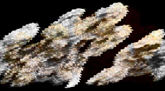 Chinese Jade Scholar's Rock: A captivating Chinese jade scholar's rock, exhibiting an intricate natural formation with a smooth, polished surface. The rock displays a range of earthy tones, from creamy whites to rich browns, high