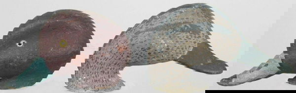 Lot of two decoy heads. A redhead drake head by B: Lot of two decoy heads. A redhead drake head by Ben Smith or Keyes Chadwick of Martha's Vineyard, MA., and a black duck by an unknown Vineyard maker Provenance: Literature: