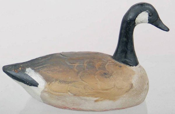 Mini Canada Goose by Schmidt: Mini Canada goose. Nicely feather carved. Tight (4") body check. Provenance: William Moore collection