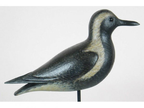 Black Bellied Plover by David Ward, Essex, CT: Elegant black bellied plover with carved and raised wings and split tail in the Crowell style by Dave Ward, Essex, Conn. XOC and branded “D.B.W”.