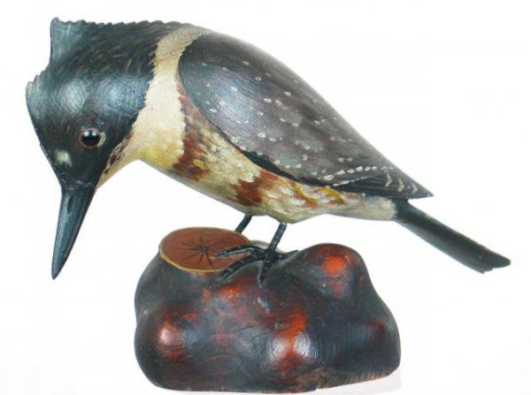 Kingfisher by A. E. Crowell, Oval Brand: Exceptional life size female belted kingfisher ca 1916 by A. E. Crowell, East Harwich, MA. Mounted on a unique base carved to resemble a section of tree with a cut branch. Deeply impressed oval hot br