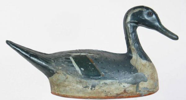 Anderson Co. Tin Pintail Drake Decoy, CA: Rare pressed tin pintail drake decoy by the Anderson Decoy Co, CA. Made in three pieces, bottom, left, and right sides. Glass eyes and Impressed "Anderson Decoys" on the bottom. OP with flaking and we