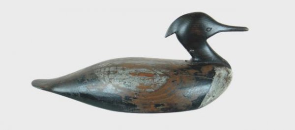 Maine Merganser with an inlet head: 42. Willy Ross red-breasted merganser hen with replaced head. Faint traces of original paint on body but worn almost completely to bare wood. Few thin body checks. 100-200