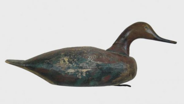 Merganser Hen: 129. Swimming red-breast merganser hen from Cape Cod. Original paint on body with heavy wear. Head is a combination of original and some gunning touchup and darkening. Shallow, fine puppy chew to tip 