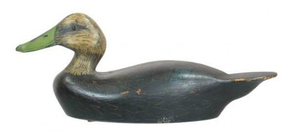 Ken Huntley Black Duck: 707A. Graceful black duck by Kenneth H. (Bud) Huntley, Gananoque, Ontario. Excellent original paint with light overall wear. A few very light rubs, scuffs or blemishes along edge of tail and a small a
